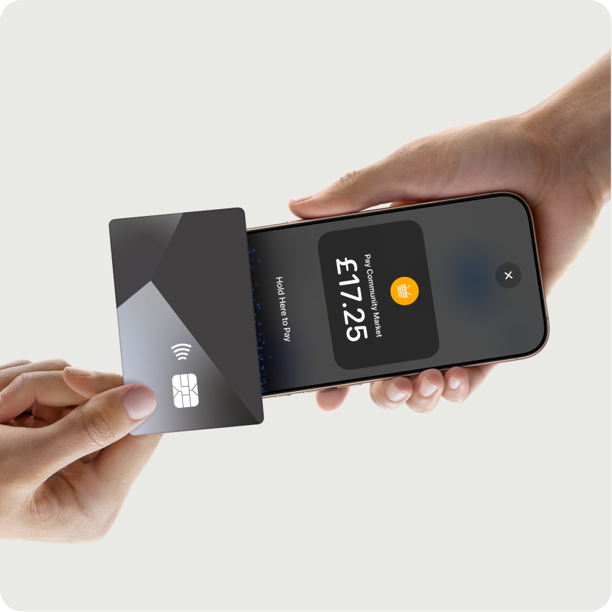 Contactless card being tapped on an iPhone using Tap to Pay